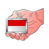 hand holding Monaco flag