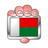 hand holding Madagascar flag