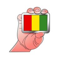 hand holding Guinea flag