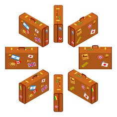 Set of standing brown travelers suitcases