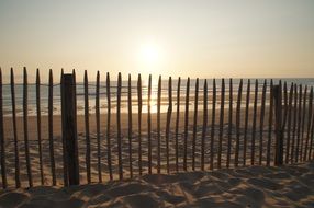 Constipation on the beach during sunset