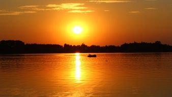 Lake at the Bright sunset