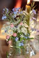 Close-up of the decorative beautiful flowers in the jar