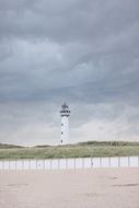 lighthouse on hill at cloudy sky, Netherlands