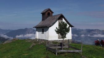 white chapel in the mountains