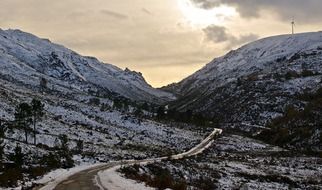 road among snowy mountains in northern portugal