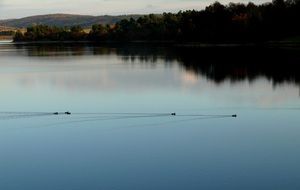 quiet expanse of the lake at sunset