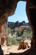 a passage in a rock in a canyon in spain