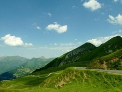 mountain road in a green valley in France