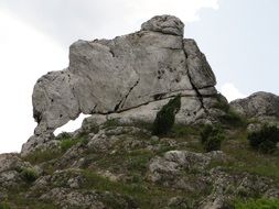 scenic rock formation at clouds, poland, Kraków-Częstochowa Upland