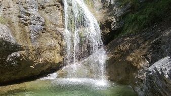extraordinarily beautiful alpine waterfall