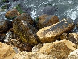 natural brown stones on the shore