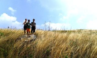friends on a hill in indonesia