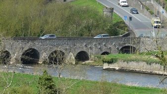 beautiful stone bridge over the river in Ireland