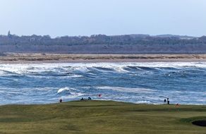 scenery of Amazing golf course and waves of sea