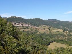 distant village in wilderness at summer, france, aire de montjaux