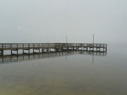 bridge to the sea in the fog