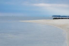 beach near the sea with white sand