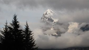 Distant view of the top of junfrau in a cloudy haze