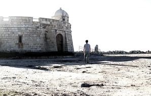walk in front of the lighthouse