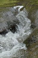 river flowing between stones