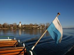 boat with flag on Chiemsee lake