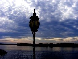 lantern in the evening shadows scene