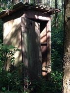 wooden forest toilet