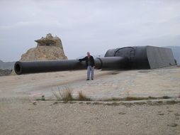man near big weapon