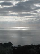 sun rays through the clouds over the black sea