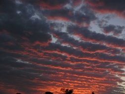 red glow in the evening clouds