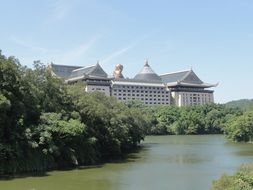 white house near the river