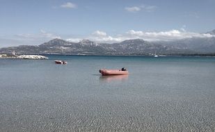 boat by ocean shore