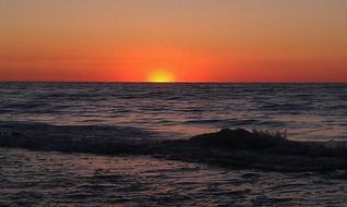 waves at sunset