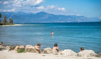 lake garda beach mountain view