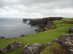panorama of the rocky coast of the shetland islands