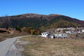 village at road near mountains, slovakia, greater fatra