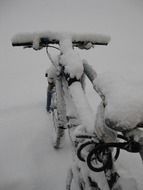 Bicycle among snow