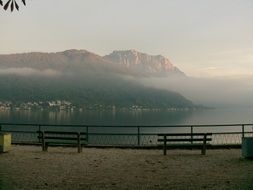 lake and mountains in mist at morning, austria