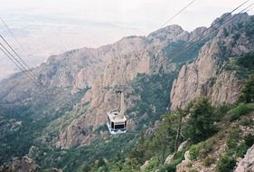 cable car on road at scenic mountains