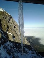 icicle against the mountain close-up