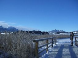 wooden bridge on a background of alpine panorama