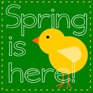 spring is here as a text on a green picture