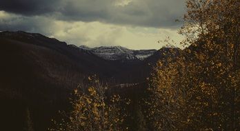 landscape of darkness over the tops of the mountains