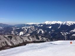 view from the snowy top of the mountains