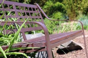 brown bench in the park