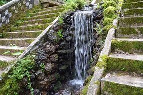 waterfall between stone stairs at Bucaco Palace