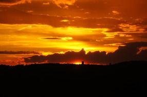 clouds on a fiery sky at sunset