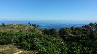 beautiful green coast at blue sea, italy, tenerife