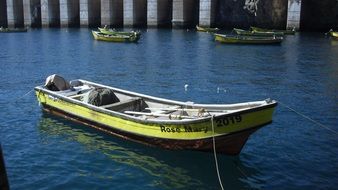 fishing boats on the water on a sunny day